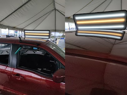 Paintless dent repair reflection board showing body line damage